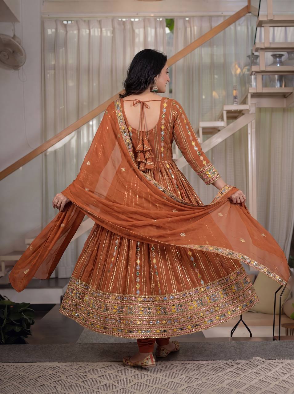 Radiant Rust Orange Flared Anarkali Suit Set Adorned with Multicolored Geometric Embroidery and Dazzling Mirror Work Detailing